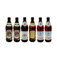 Six bottles of beer with various labels on a white background