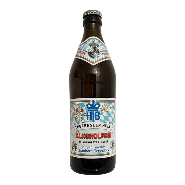 Bottle of Tegernseer Hell beer with a label on a white background