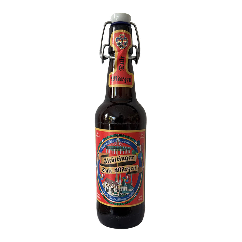 A bottle of Altottinger Dult Marzen beer with a swing-top closure, featuring a red and blue label with a circus theme, set against a plain white background.