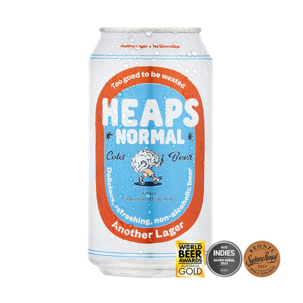 Can of 'Heaps Normal' non-alcoholic beer with colorful label on a white background