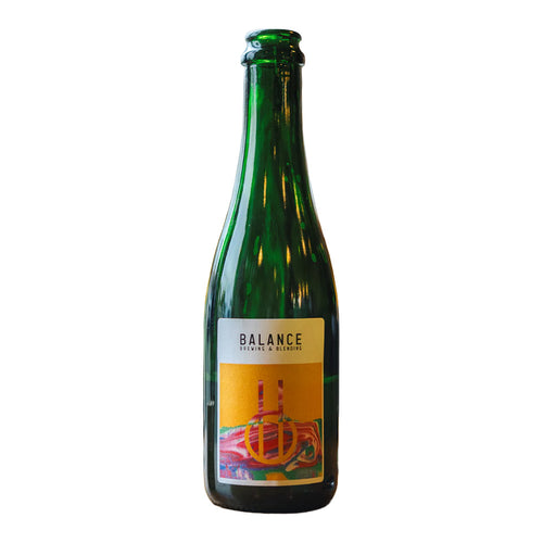 Green bottle with a colourful label on a white background