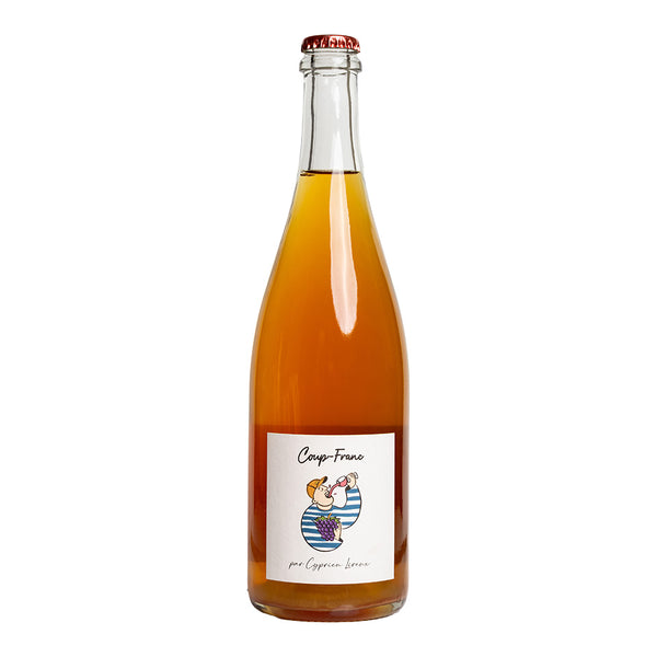 A glass bottle of cider filled with amber-coloured liquid and topped with a red crown cap, set against a plain white background.