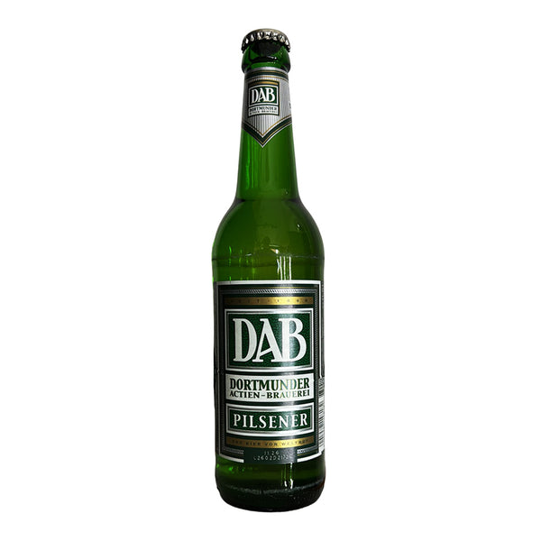 A green glass bottle of DAB Dortmunder Pilsener beer on a plain white background.