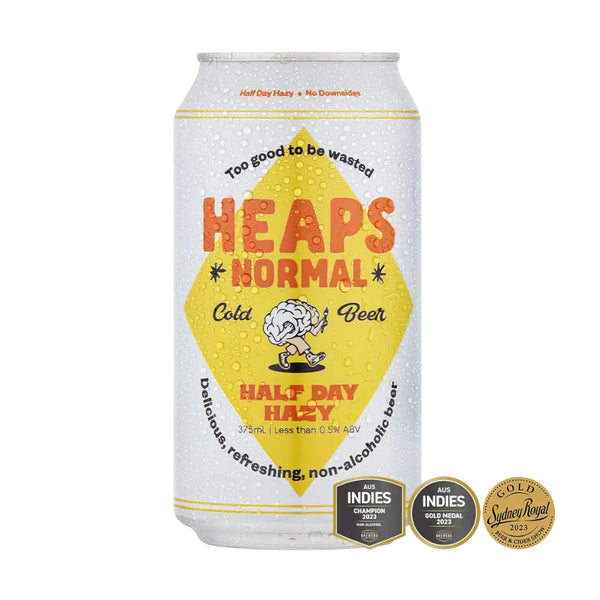 Can of 'Heaps Normal' non-alcoholic beer with branding and awards on a white background