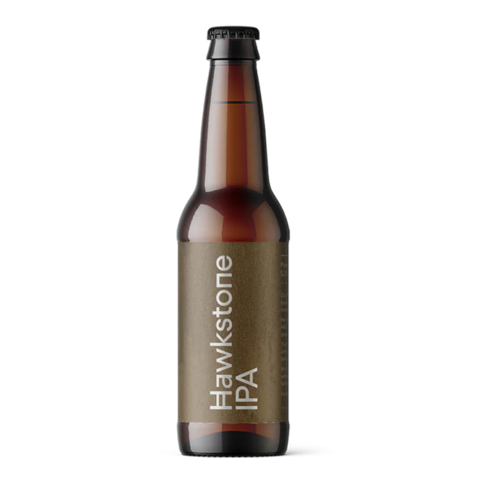 Brown beer bottle with 'Hawkstone IPA' label on a white background