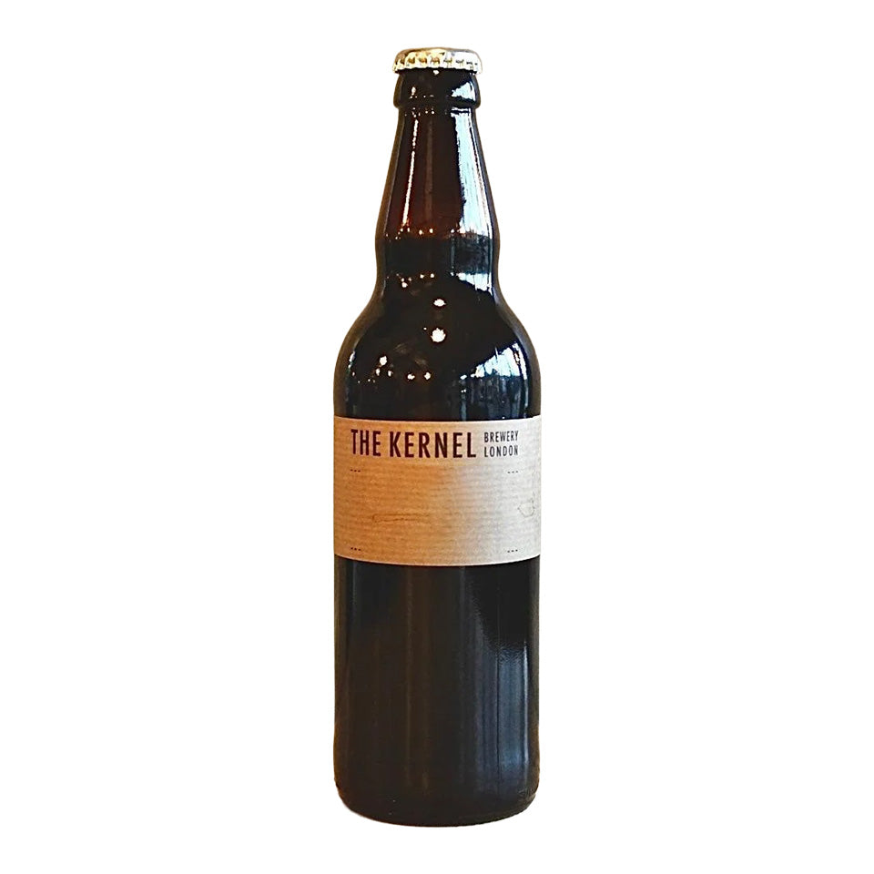 A dark brown glass bottle of The Kernel Brewery London with a beige label and a gold crown cap, isolated on a white background.