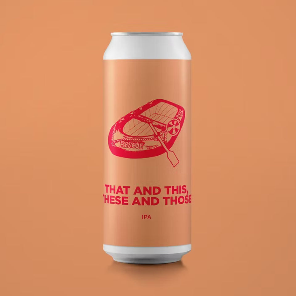 Beer can with red and white design on an orange background
