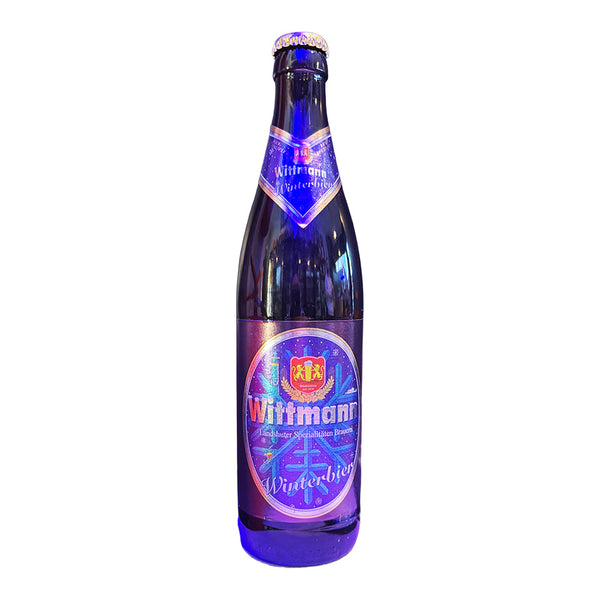 Bottle of Wittmann beer with a colorful label on a white background