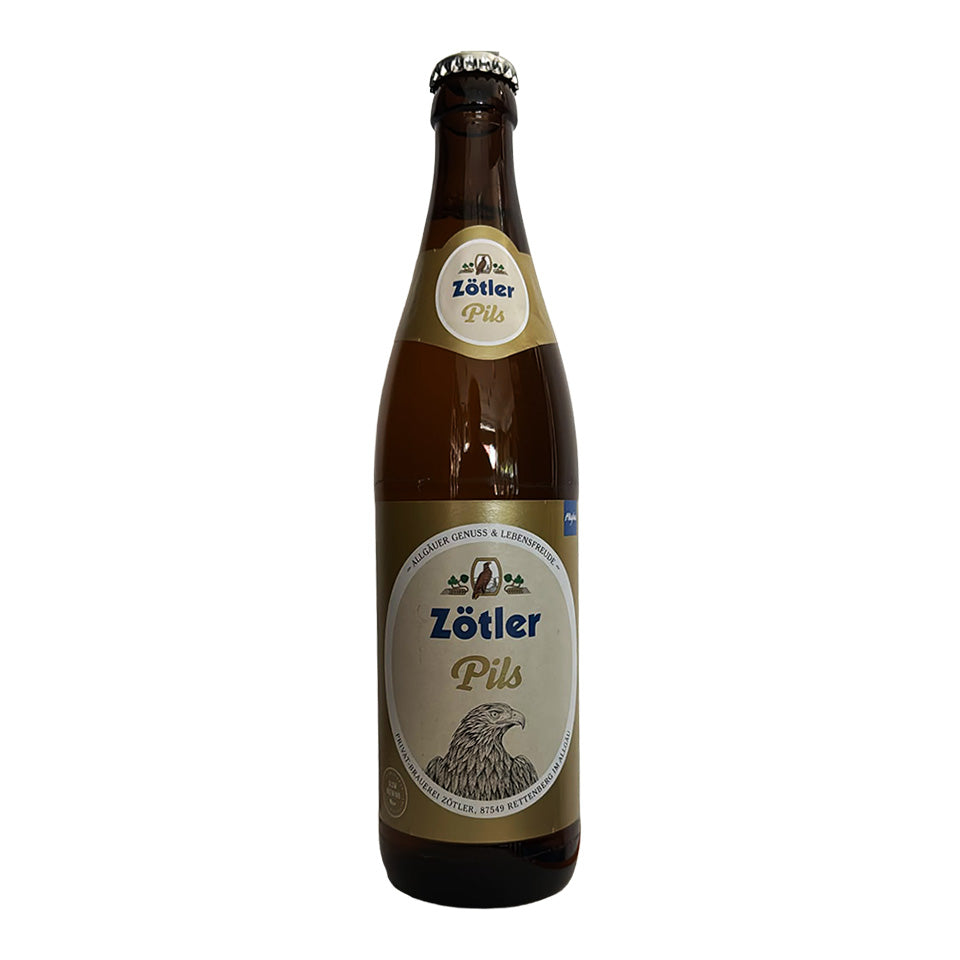 A single bottle of Zötler Pils beer in a dark brown glass bottle with a cream and gold label, shown against a plain white background.