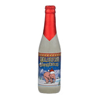 A bottle of Delirium Christmas Spiced Fruity Winter Ale with a label featuring an illustration of an elephant and Christmas-themed elements.